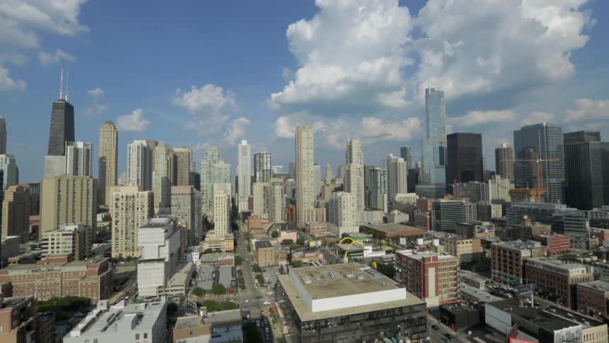 A city has many tall towers lining the horizon