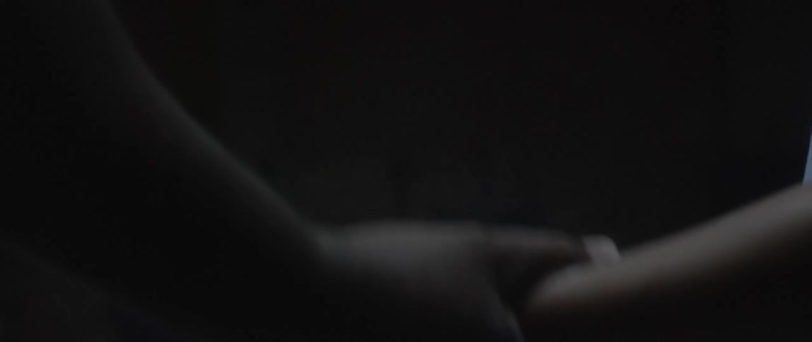 Closeup of a man applying training magnesium powder to a boys hands