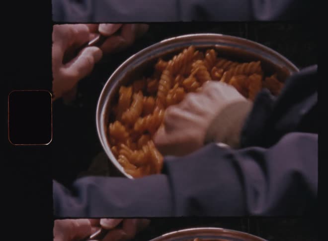 A clip of people preparing macaroni