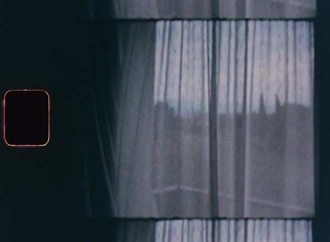 Curtain on a balcony moving due to the force of the wind