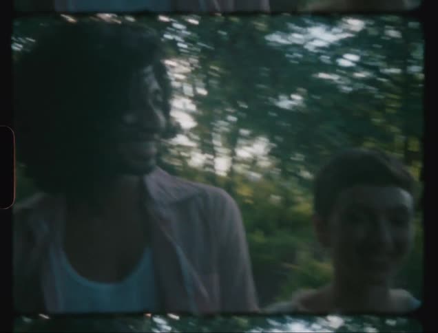 A clip of a couple in the forest
