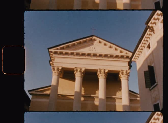 The sun is shining on the large church