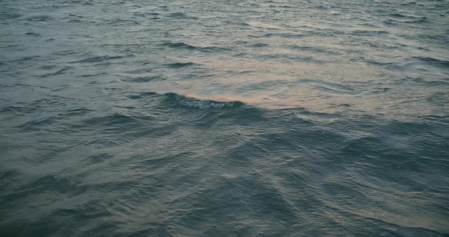 The sun reflects off the ocean