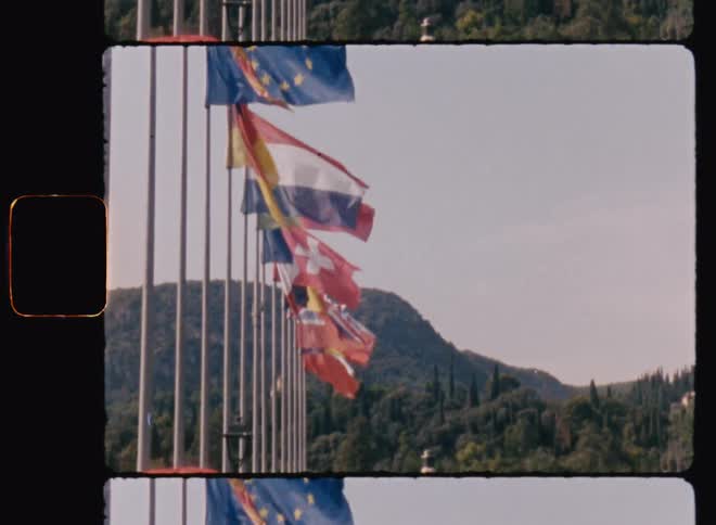 Flags waving in the wind during the day