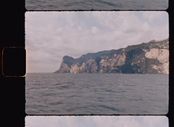 Ocean and mountains as natural landscape during cloudy day