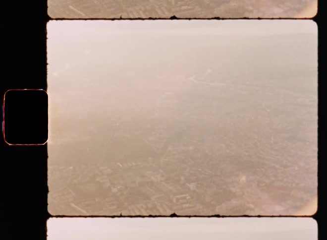 Aerial of the city with fog during the day