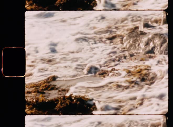 Waves crash on the sand