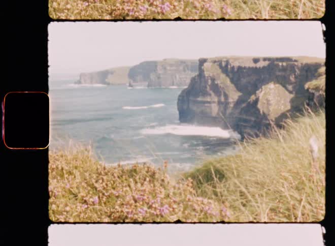 The ocean is lined by cliffs