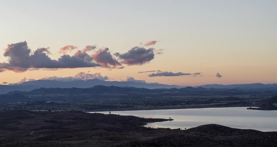 Aerial panorama of a river in the middle of a natural environment with the morning sky