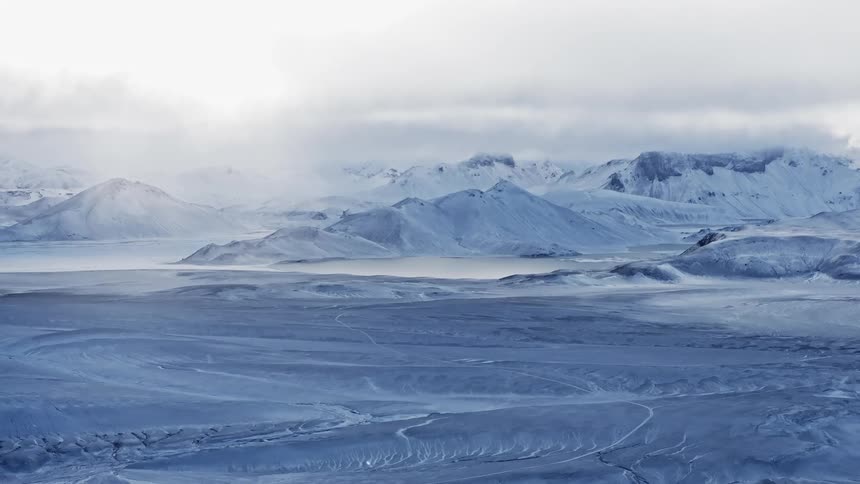 Panorama of icy mountains with lakes around
