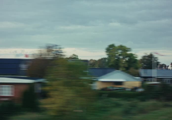 The homes are spaced out on the fields.