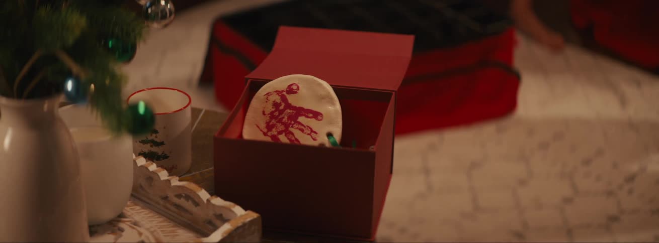 The ornament lays in the box
