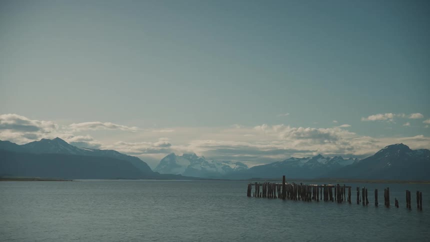 Abandoned pier on a lake in the mountains