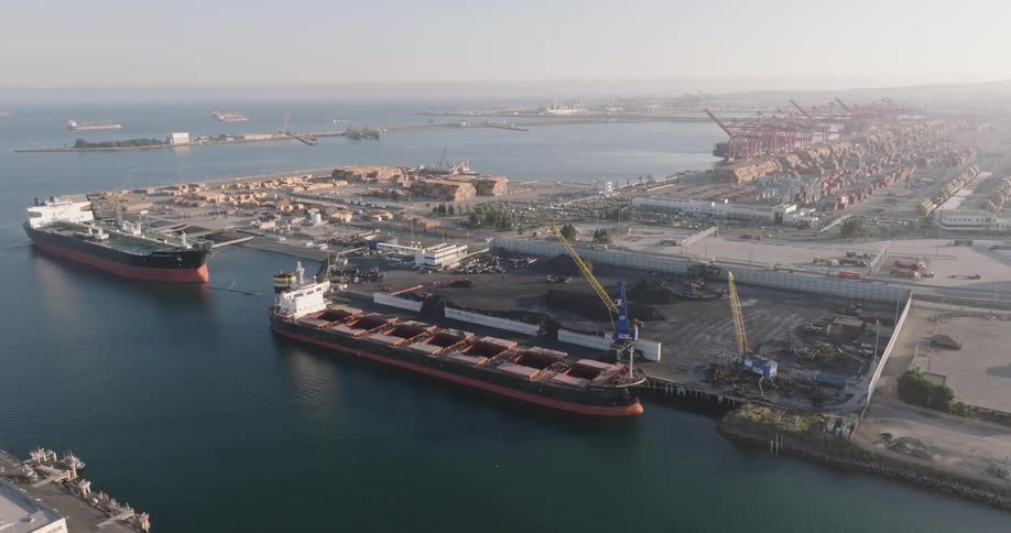 Ships anchored in a port under construction in the city