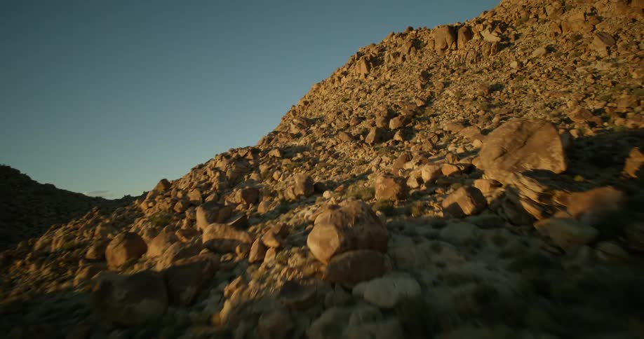 Aerial view of rocks and boulders on the slopes of a mountain