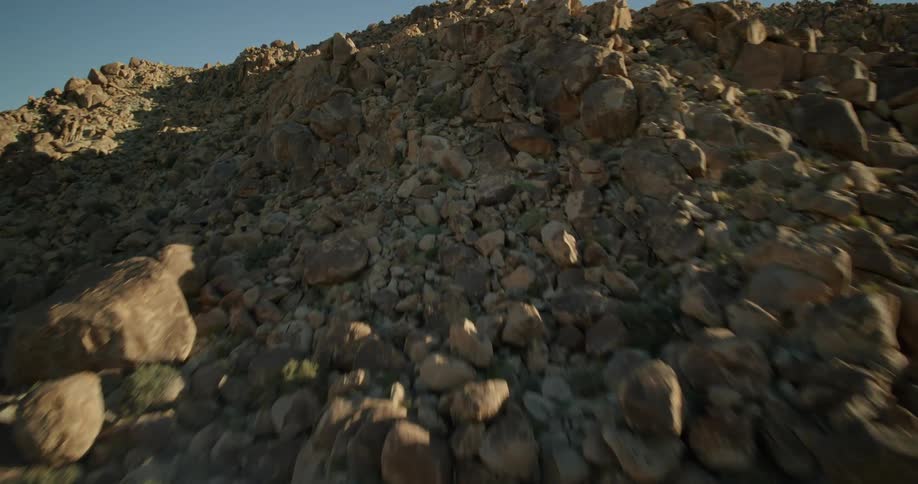 Aerial view of the rocks and boulders on the slopes of a mountain