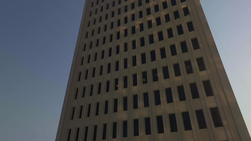 The building is lined with many windows