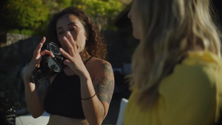 Woman talks to a friend outdoors