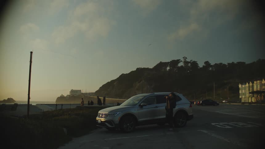 Woman getting out of her vehicle and going to enjoy the view
