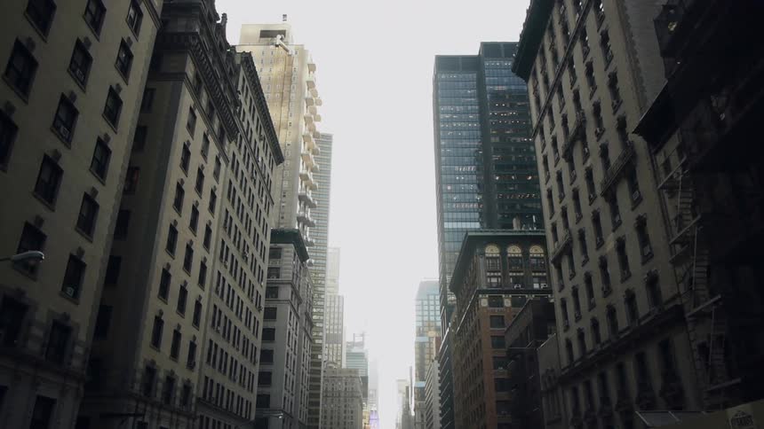 City buildings tower over a street