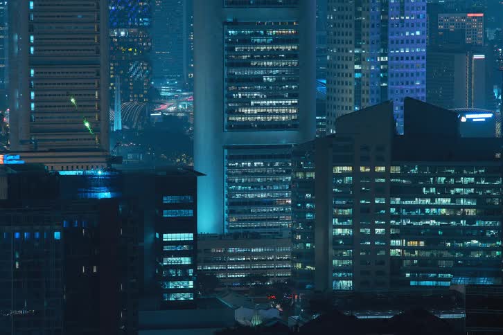 Time lapse of lights blinking and flashing in the city at night