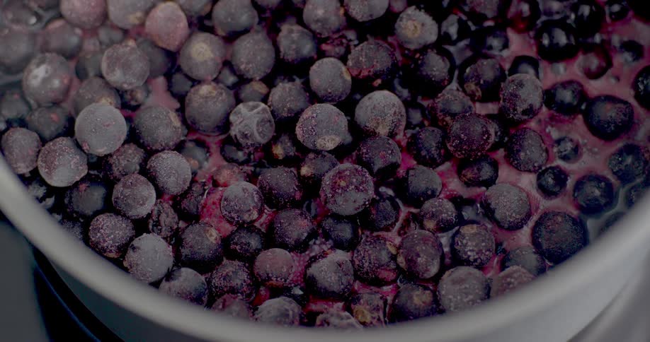 Berries boiling inside a cooking pot