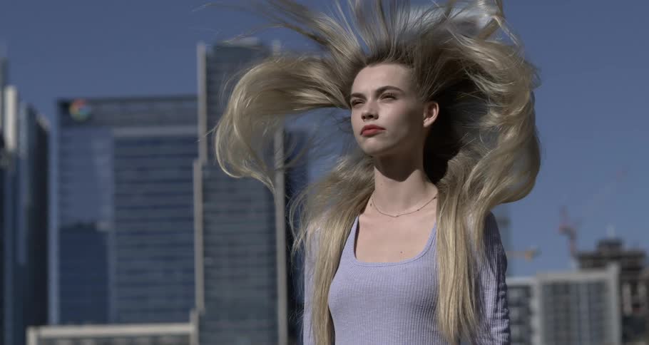 A woman with her hair floating in the air