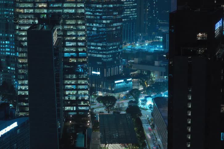 Time lapse of lights going on and off in the city at night