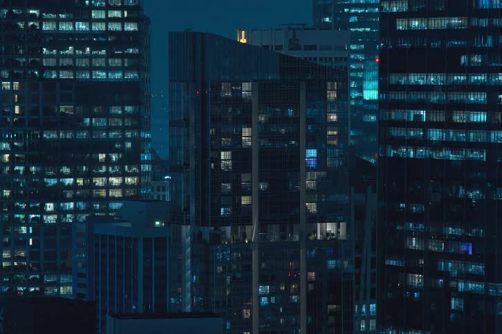 A clip of apartments with electricity in various skyscrapers