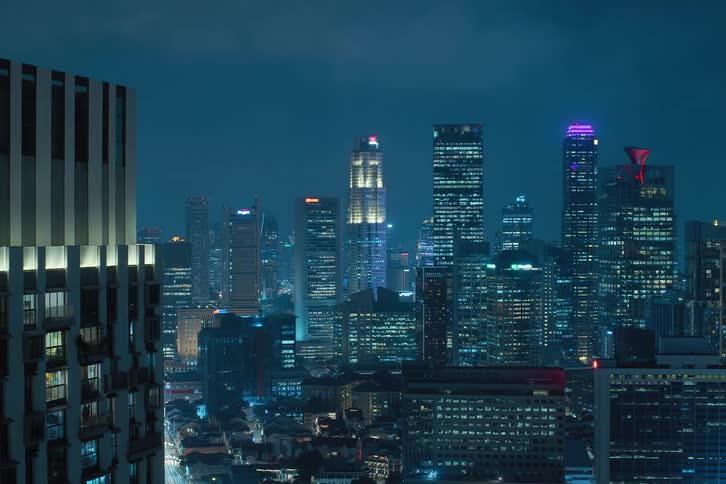 Panorama of a metropolis with night skyscrapers in time lapse