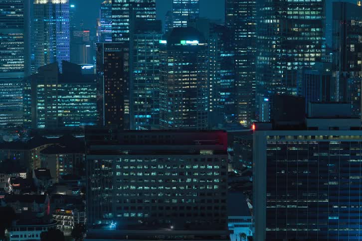 View of a metropolis at night in time lapse with lights