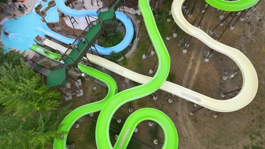 People are riding the slides in this water park