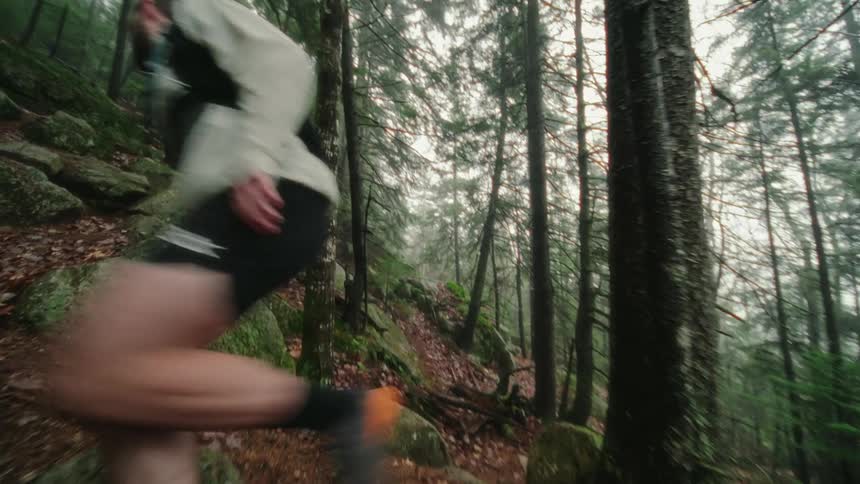 A man running through a forest