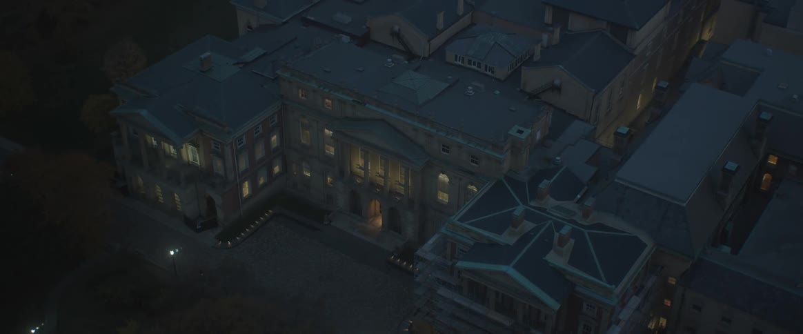 Aerial panorama of a residential condominium at night