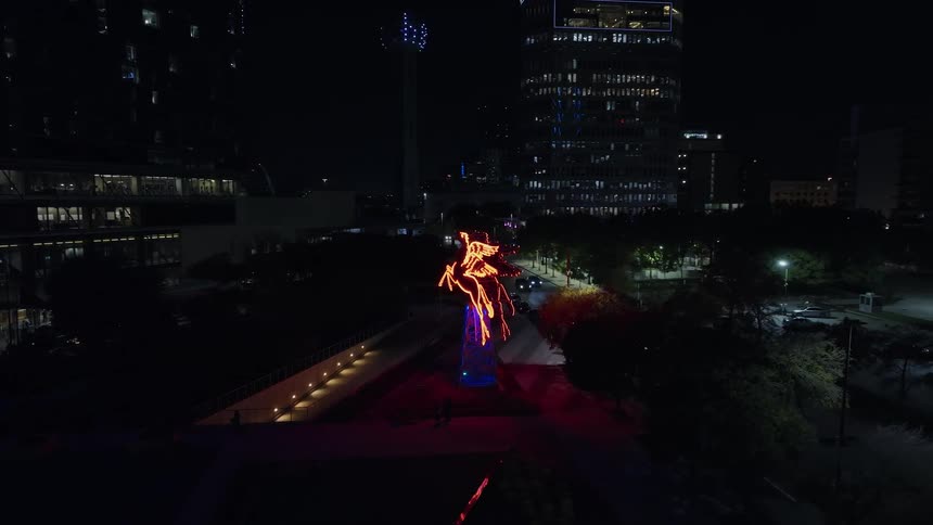 Small tower decorated with lighting in a metropolis at night