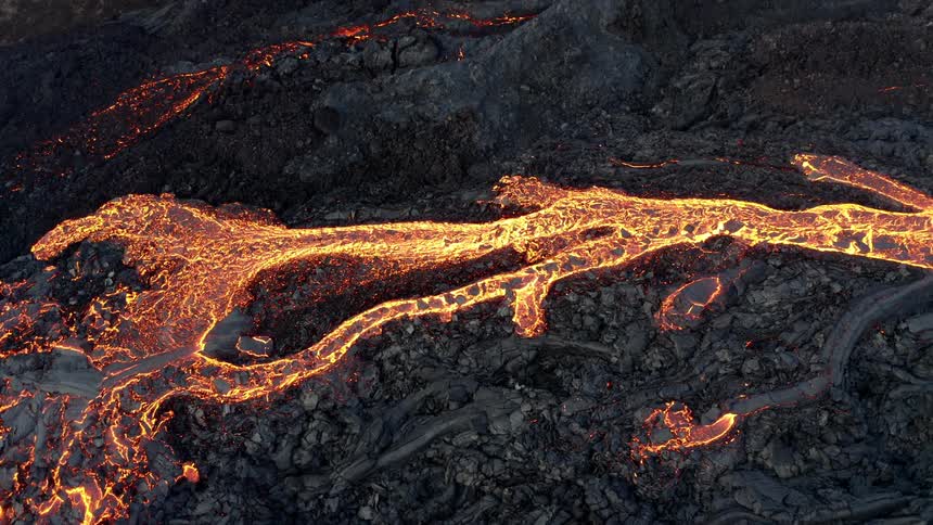 Aerial view of lava streams from a volcanic eruption
