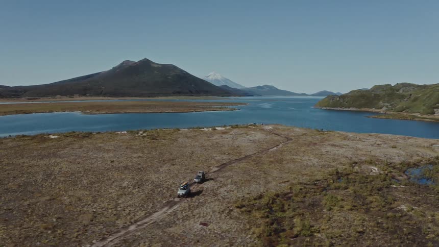 Vehicles drive on the island