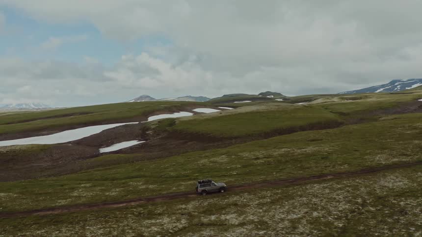 A vehicle is driving off road