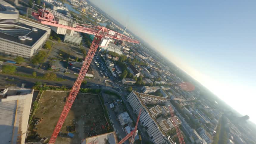 Aerial of buildings under construction in a city on a sunny day