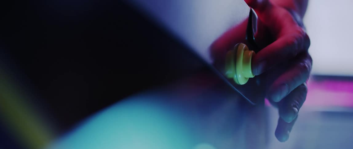 Closeup of a persons fingers pressing a button