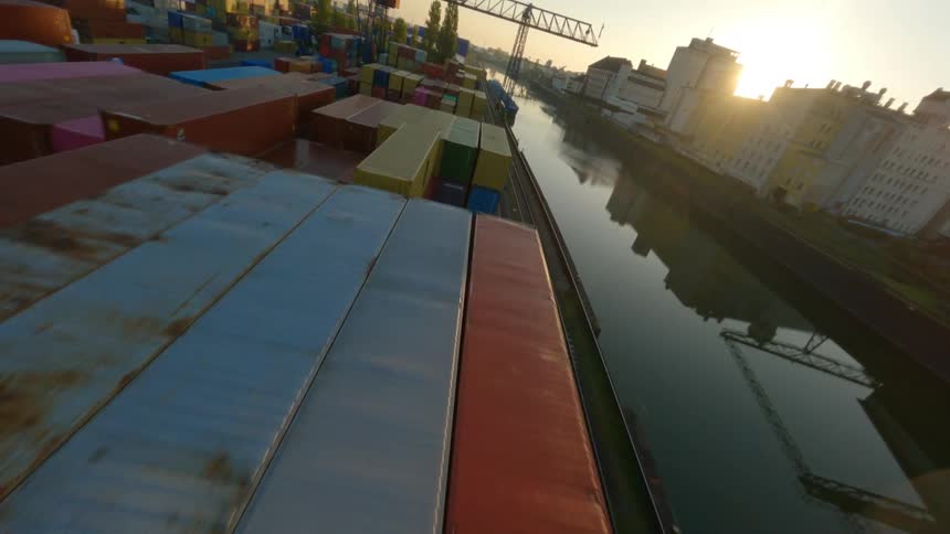 The harbor is full of stacked storage containers