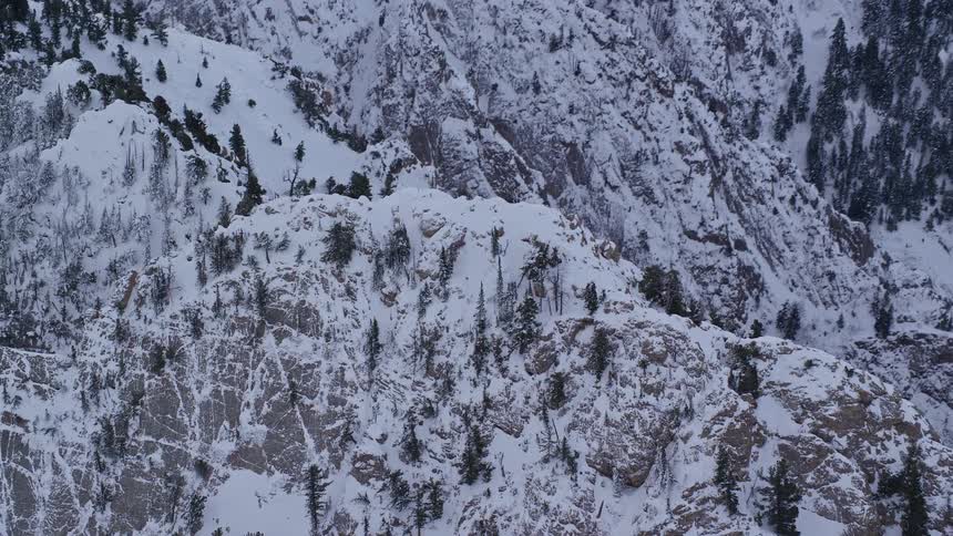 Aerial view of the snowy ridge of a mountain