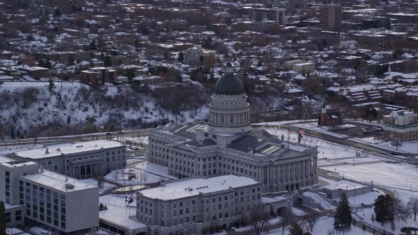 Aerial panorama of the congress in the midst of an urban city covered in snow