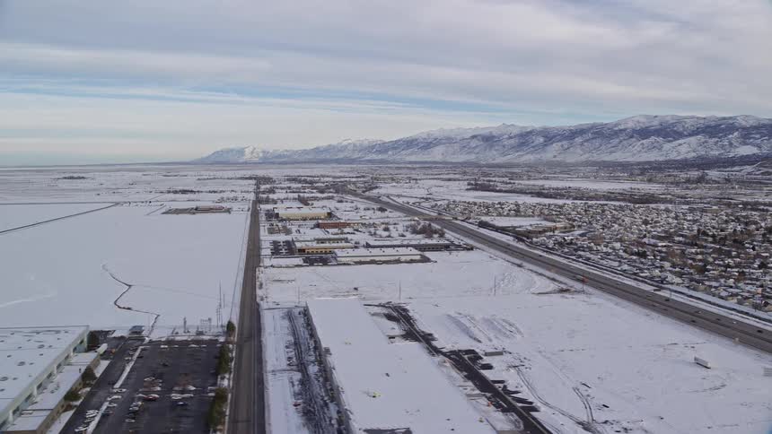 Aerial of rural town covered in snow during winter