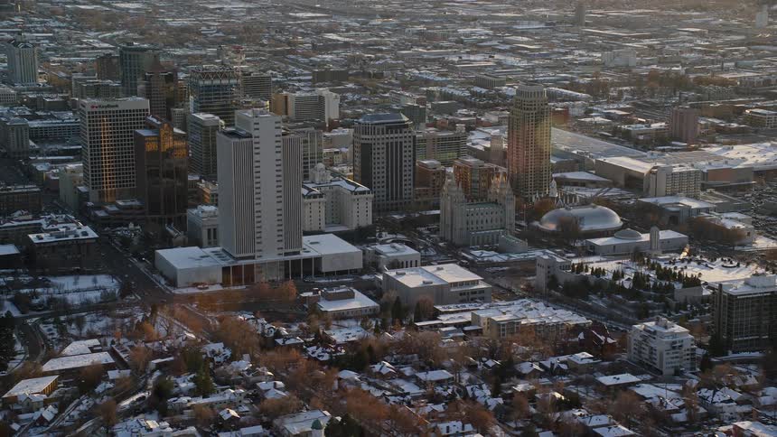 Skyline of an urban city with snowcovered buildings and houses
