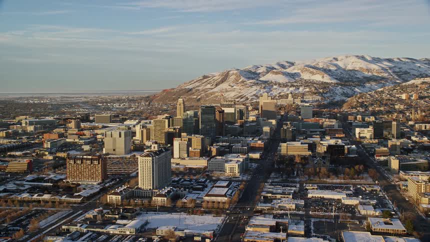 A city sits near the mountain range