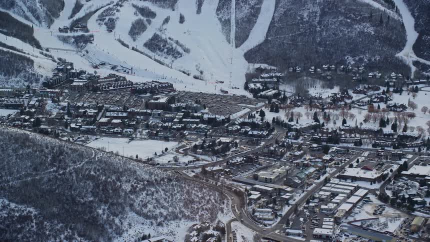 Aerial view of snowy suburban area in the city