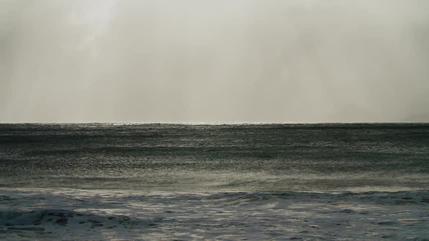 View of the sea with small waves in slow motion