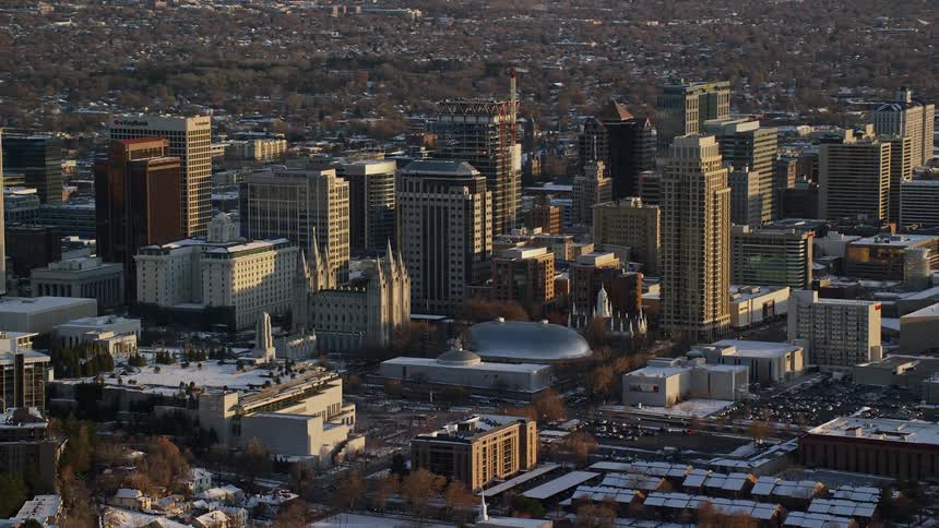 An aerial view of a downtown city tower block in the winter