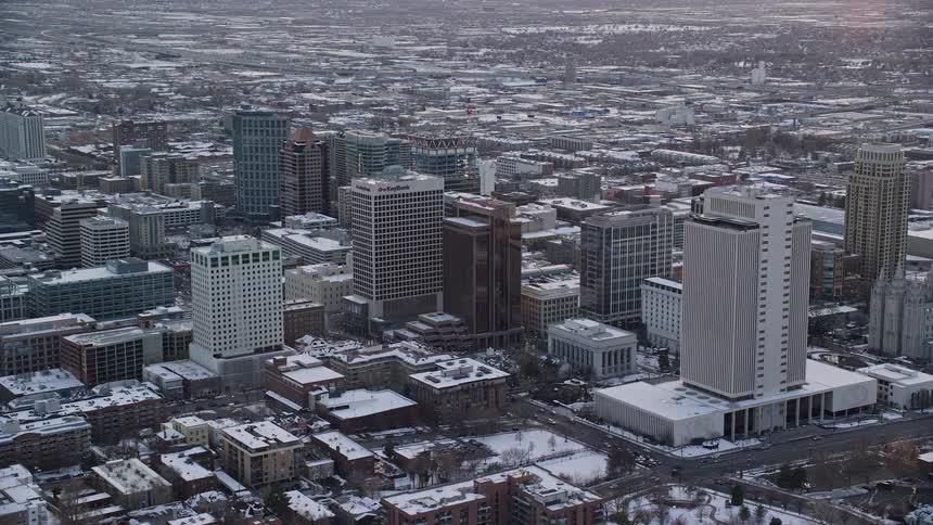 Skyline of an urban city with skyscrapers at dusk during winter